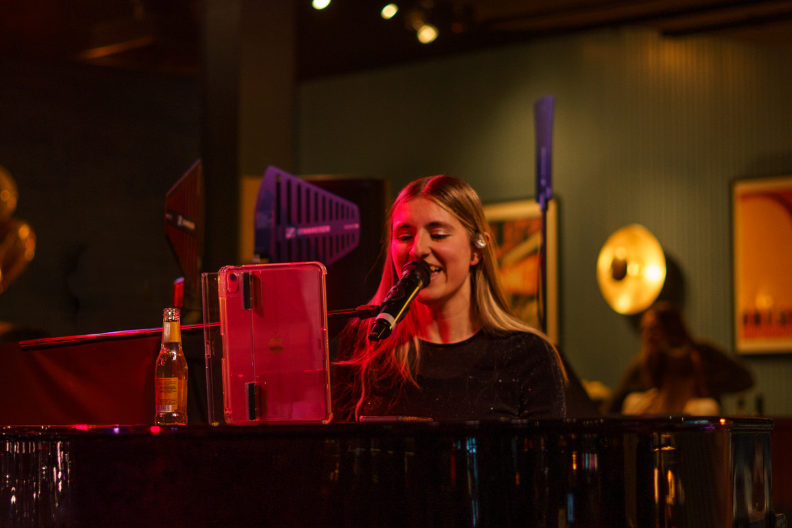 A musician performing live using Vyra